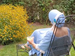 Jane Austen sitting in garden