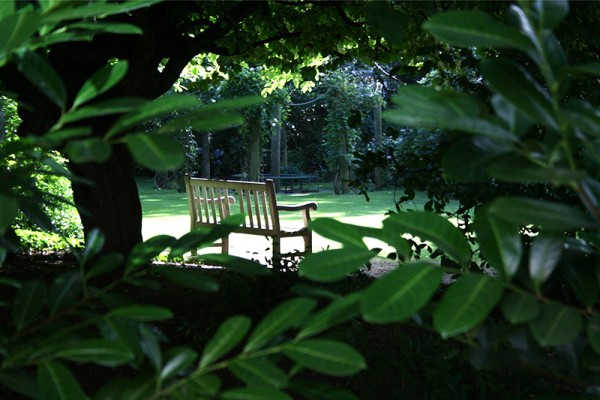 A glimpse through the fence at Hans Place Square garden area